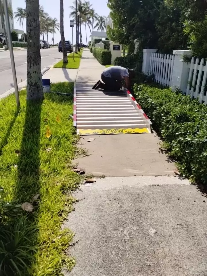 sidewalk ramp to allow hose to cross sidewalk